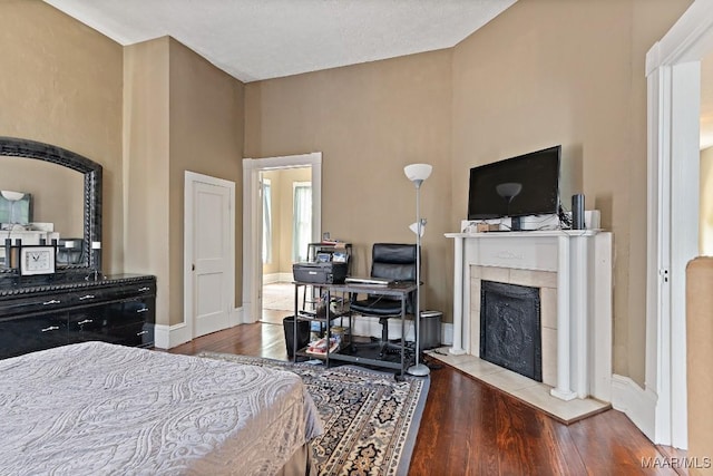 1802 Madison Ave, Montgomery, AL 36107 - bedroom featuring wood finished floors and a fireplace