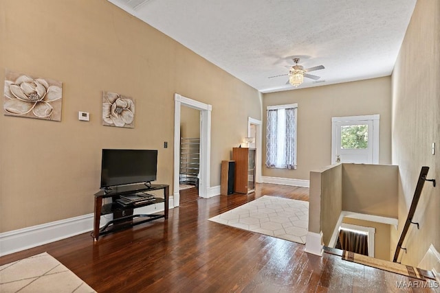 1802 Madison Ave, Montgomery, AL 36107 - entrance foyer with wood finished floors, a ceiling fan, and a textured ceiling