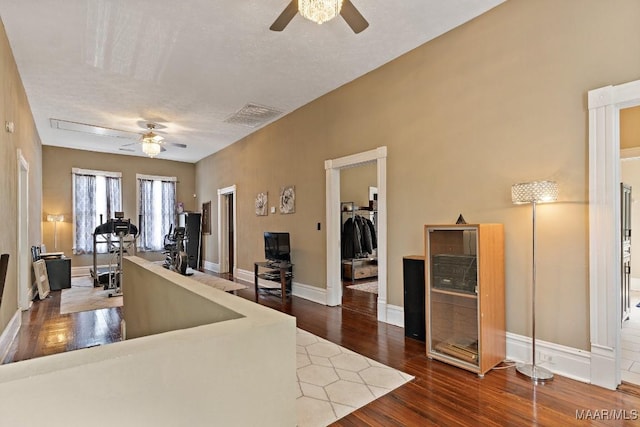 1802 Madison Ave, Montgomery, AL 36107 - living area with a ceiling fan and wood finished floors