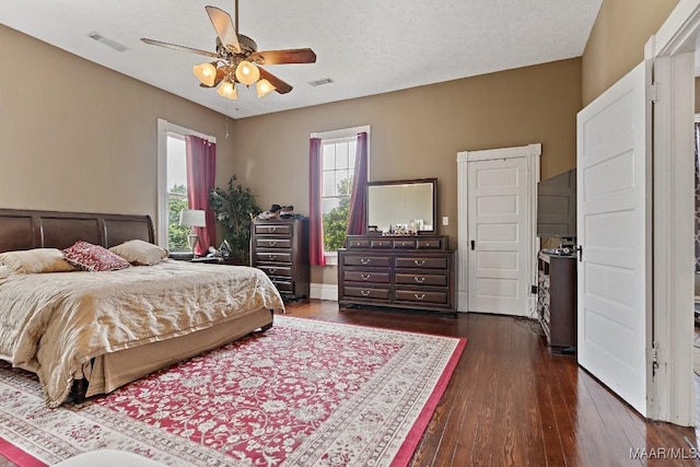 1802 Madison Ave, Montgomery, AL 36107 - bedroom with dark wood-style flooring and a ceiling fan