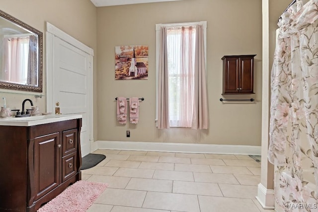 1802 Madison Ave, Montgomery, AL 36107 - full bathroom featuring vanity and tile patterned floors