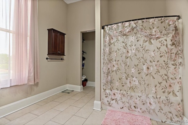 1802 Madison Ave, Montgomery, AL 36107 - full bathroom featuring tile patterned floors and baseboards