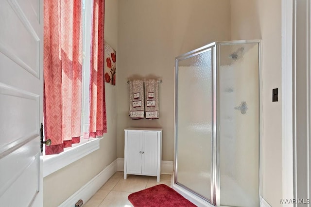 1802 Madison Ave, Montgomery, AL 36107 - bathroom featuring a shower stall and tile patterned flooring
