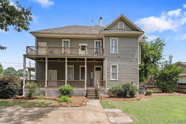 1802 Madison Ave, Montgomery, AL 36107 - view of front facade with a balcony, a porch, and a chimney