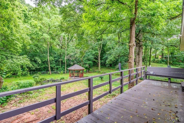 3534 Milan Dr, Montgomery, AL 36109 - wooden deck featuring a gazebo and a wooded view