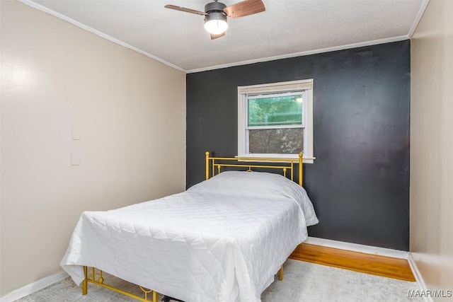 3534 Milan Dr, Montgomery, AL 36109 - bedroom featuring crown molding, wood finished floors, and a ceiling fan
