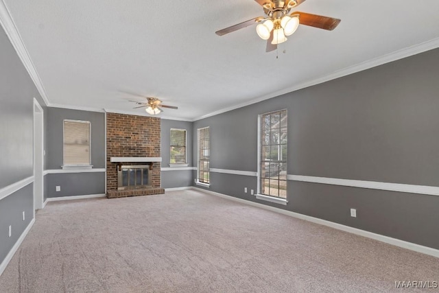 508 Ridgewood Ln, Montgomery, AL 36109 - unfurnished living room featuring a ceiling fan, crown molding, carpet floors, and a brick fireplace