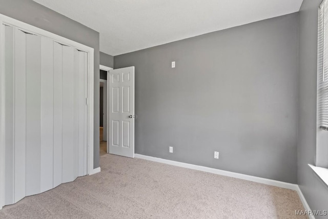 508 Ridgewood Ln, Montgomery, AL 36109 - unfurnished bedroom featuring carpet flooring and a closet