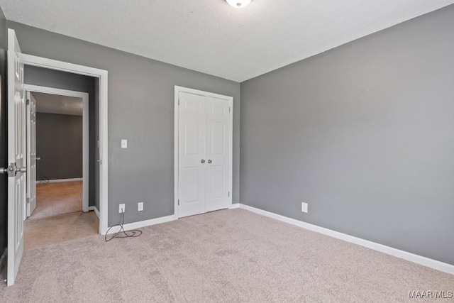 508 Ridgewood Ln, Montgomery, AL 36109 - unfurnished bedroom featuring light colored carpet and a closet