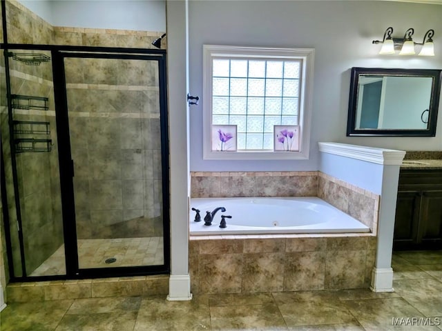 134 Southern Hills Rdg, Wetumpka, AL 36093 - bathroom with a whirlpool tub, a shower stall, vanity, and tile patterned floors