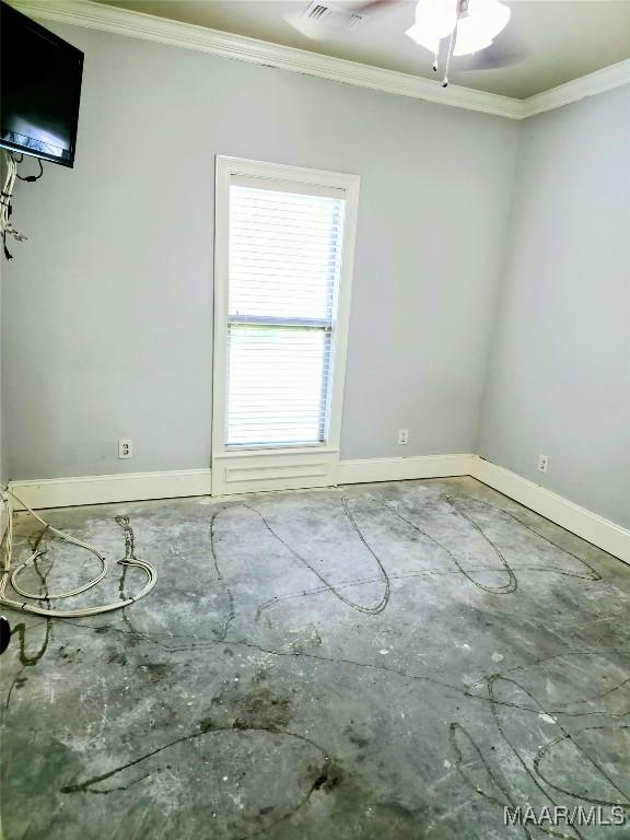 134 Southern Hills Rdg, Wetumpka, AL 36093 - spare room featuring crown molding and baseboards