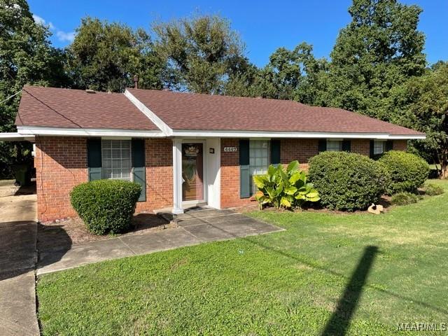 4447 Wares Ferry Rd, Montgomery, AL 36109 - ranch-style home with brick siding, a front yard, and a shingled roof