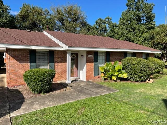 4447 Wares Ferry Rd, Montgomery, AL 36109 - single story home with brick siding, a front yard, and a shingled roof
