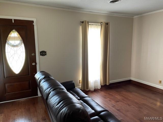 4447 Wares Ferry Rd, Montgomery, AL 36109 - entrance foyer with wood finished floors and crown molding