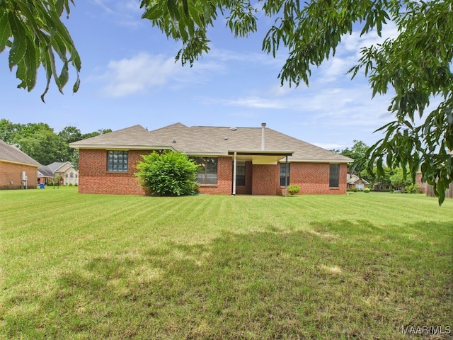 508 Mossy Oak Rdg, Prattville, AL 36066 - back of house with a lawn and brick siding