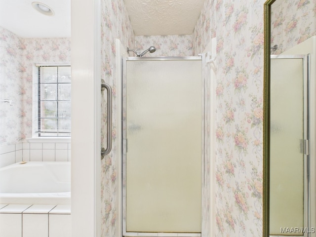 508 Mossy Oak Rdg, Prattville, AL 36066 - full bathroom featuring a stall shower, wallpapered walls, and a garden tub