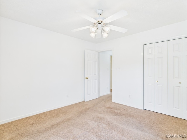 508 Mossy Oak Rdg, Prattville, AL 36066 - unfurnished bedroom with light colored carpet, a closet, and a ceiling fan
