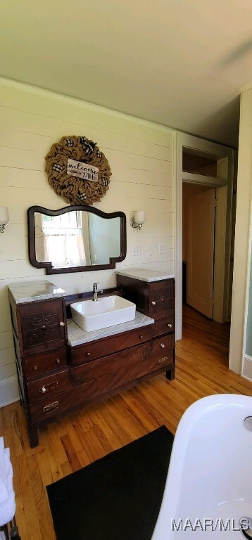 1928 Winona Ave, Montgomery, AL 36107 - bathroom with wood finished floors and vanity