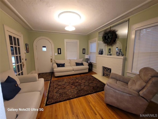 1928 Winona Ave, Montgomery, AL 36107 - living room with wood finished floors and a textured ceiling