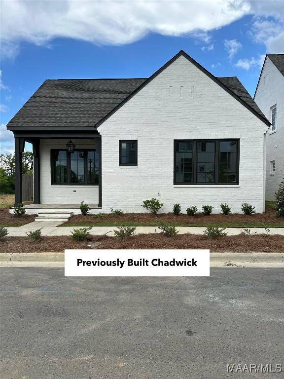 8330 Conduit St, Montgomery, AL 36116 - view of front facade with brick siding and a shingled roof