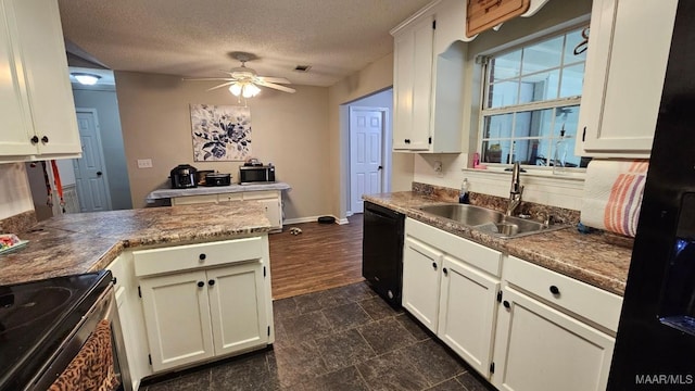 1345 Firetower Rd, Wetumpka, AL 36092 - kitchen with black appliances, ceiling fan, a peninsula, a textured ceiling, and white cabinetry