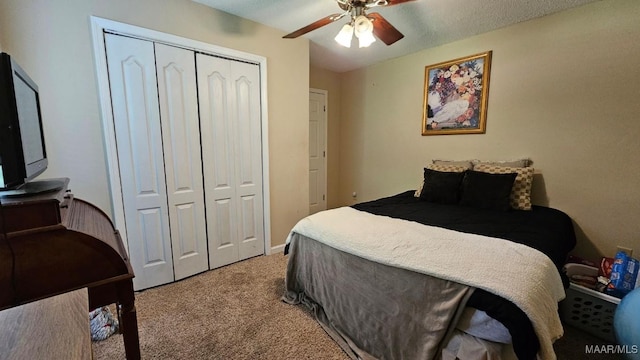 1345 Firetower Rd, Wetumpka, AL 36092 - bedroom with light carpet, a closet, and ceiling fan