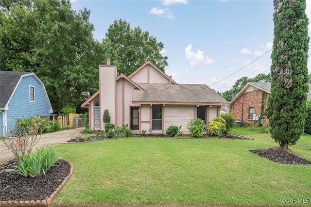 3268 Little John Dr, Montgomery, AL 36109 - view of front of property featuring a chimney, a front lawn, and concrete driveway