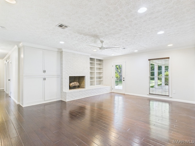327 County Downs Rd, Montgomery, AL 36109 - unfurnished living room featuring a ceiling fan, a textured ceiling, wood finished floors, recessed lighting, and built in features