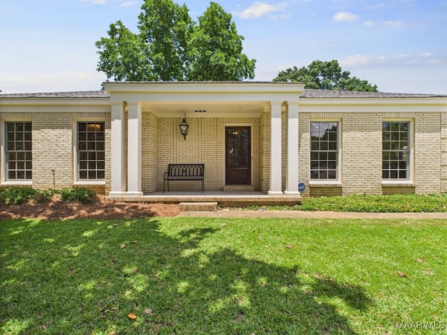 327 County Downs Rd, Montgomery, AL 36109 - entrance to property with a yard, brick siding, and a porch