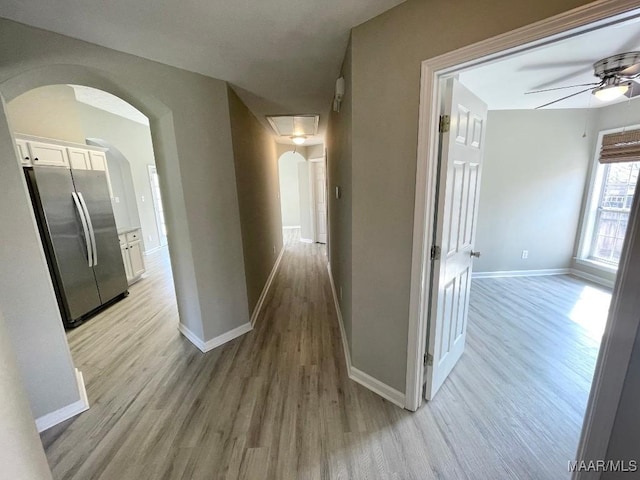 2495 Chancellor Ridge Rd, Prattville, AL 36066 - hallway featuring arched walkways and light wood-style floors