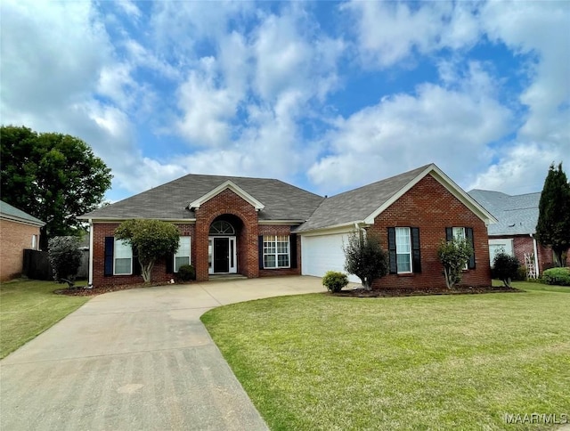 2495 Chancellor Ridge Rd, Prattville, AL 36066 - view of front of home with brick siding, concrete driveway, a garage, and a front lawn