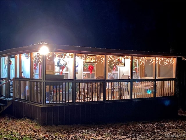 1651 Tawassee Pointe Dr, Lowndesboro, AL 36752 - back of house at twilight with a metal roof
