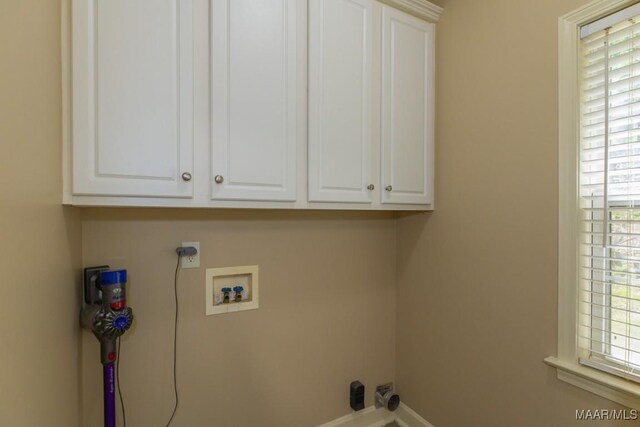 240 Winding Wood Dr, Wetumpka, AL 36093 - laundry room featuring hookup for an electric dryer, cabinet space, plenty of natural light, and washer hookup