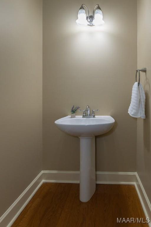 240 Winding Wood Dr, Wetumpka, AL 36093 - bathroom featuring wood finished floors and baseboards