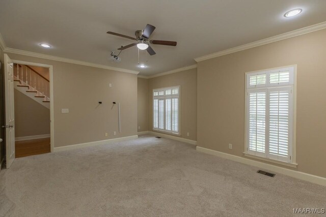 240 Winding Wood Dr, Wetumpka, AL 36093 - unfurnished room featuring a ceiling fan, ornamental molding, stairs, light carpet, and recessed lighting