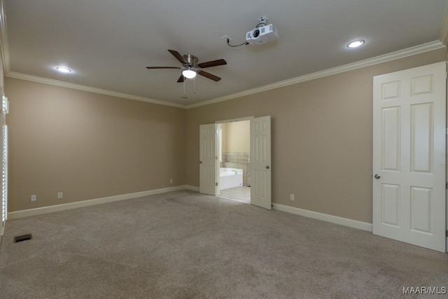 240 Winding Wood Dr, Wetumpka, AL 36093 - unfurnished bedroom featuring light colored carpet, crown molding, connected bathroom, and recessed lighting