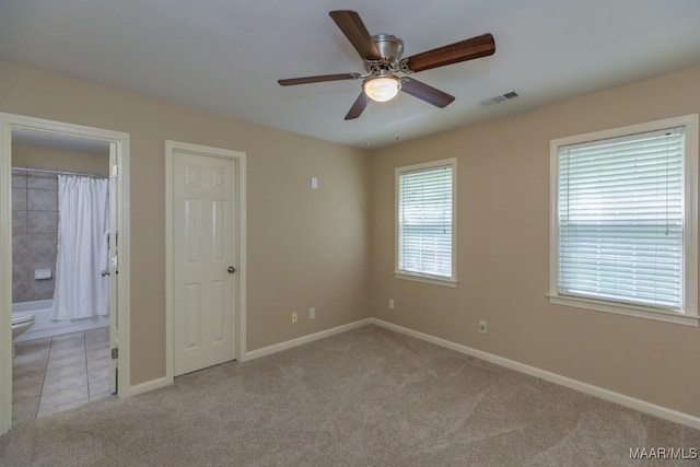 240 Winding Wood Dr, Wetumpka, AL 36093 - carpeted spare room featuring a ceiling fan and baseboards