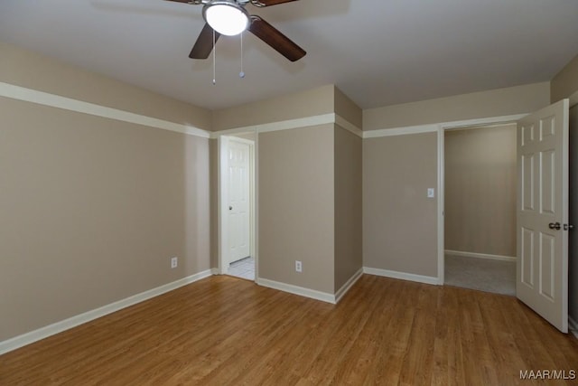 240 Winding Wood Dr, Wetumpka, AL 36093 - spare room with light wood finished floors and ceiling fan