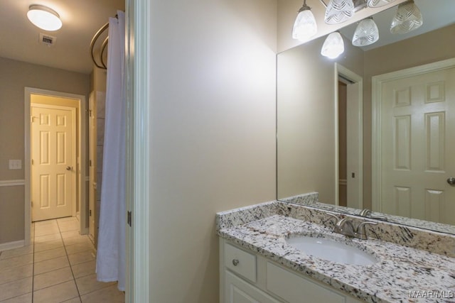 240 Winding Wood Dr, Wetumpka, AL 36093 - bathroom featuring tile patterned flooring and vanity