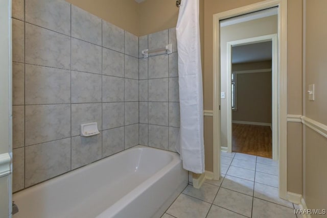 240 Winding Wood Dr, Wetumpka, AL 36093 - bathroom with tile patterned floors and shower / bathtub combination with curtain