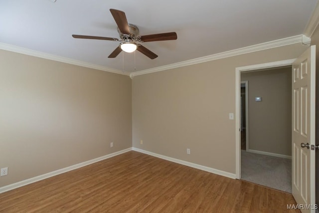 240 Winding Wood Dr, Wetumpka, AL 36093 - spare room with ceiling fan, crown molding, and wood finished floors