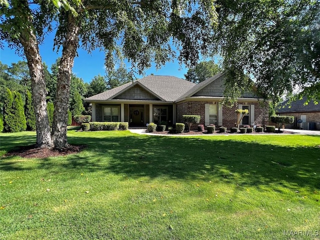309 Southern Hills Dr, Wetumpka, AL 36093 - craftsman inspired home with a front yard and brick siding
