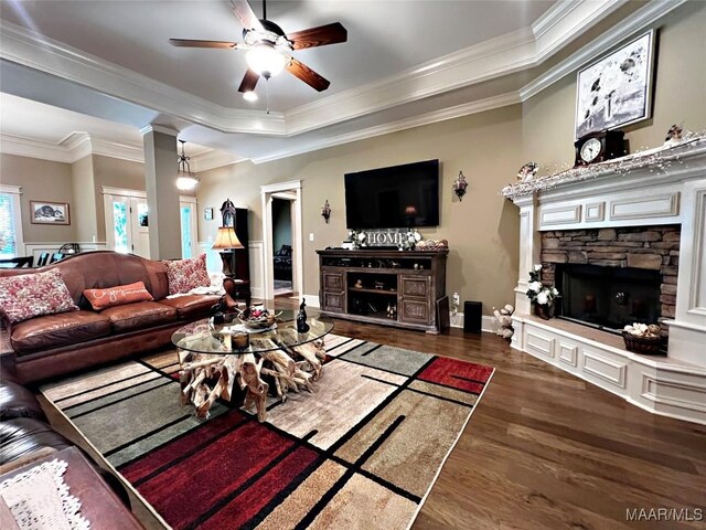 309 Southern Hills Dr, Wetumpka, AL 36093 - living area featuring a fireplace, wood finished floors, ornamental molding, a ceiling fan, and a raised ceiling