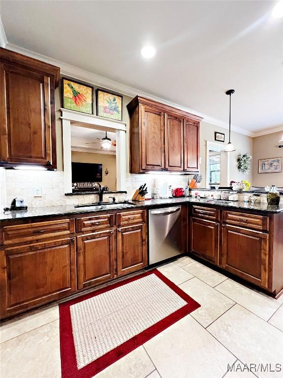 309 Southern Hills Dr, Wetumpka, AL 36093 - kitchen with stainless steel dishwasher, ornamental molding, backsplash, pendant lighting, and ceiling fan