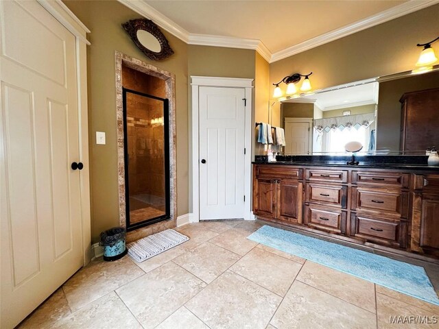 309 Southern Hills Dr, Wetumpka, AL 36093 - bathroom featuring crown molding, a shower stall, double vanity, and tile patterned floors