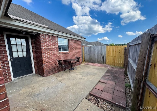 1312 Centerfield Ct, Montgomery, AL 36117 - fenced backyard featuring a patio area