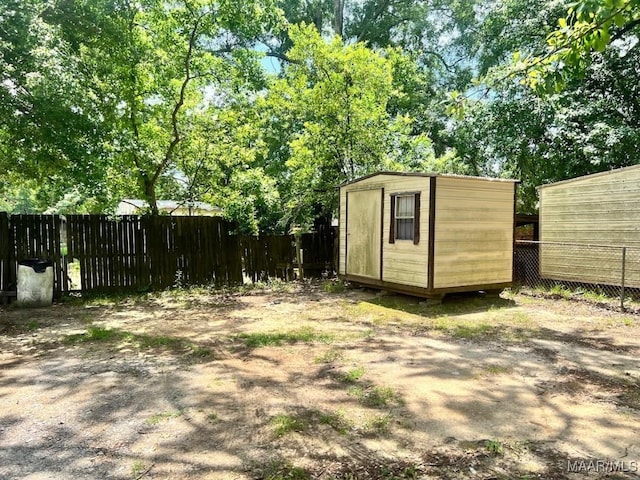 530 Brookview Dr, Montgomery, AL 36110 - fenced backyard featuring a storage unit