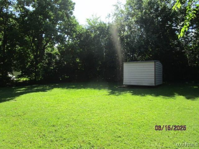 1333 Pembrook Ct, Montgomery, AL 36109 - view of green lawn with a storage unit