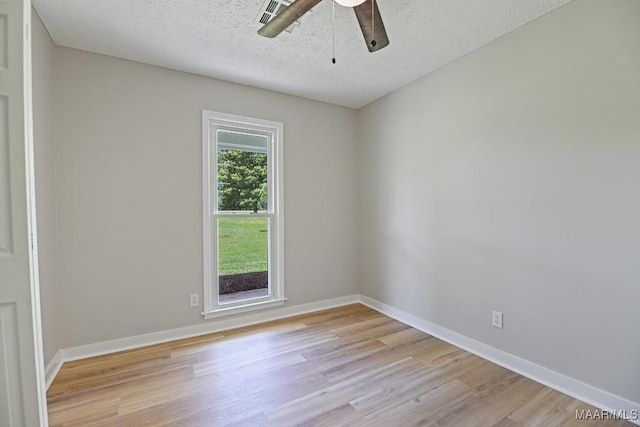 5010 Redland Rd, Wetumpka, AL 36093 - empty room featuring ceiling fan, light wood-style flooring, and a textured ceiling