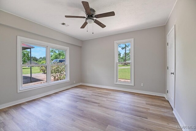 5010 Redland Rd, Wetumpka, AL 36093 - spare room with light wood-style flooring and a ceiling fan